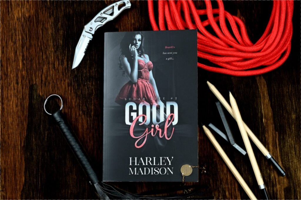 A paperback book titled "Good Girl" by Harley Madison, book two of the "Sugar Life" series
